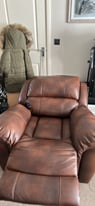 Two leather recliner armchairs