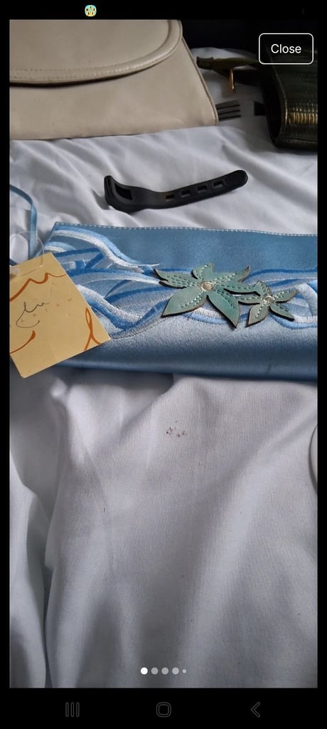 image for Blue floral clutch bag