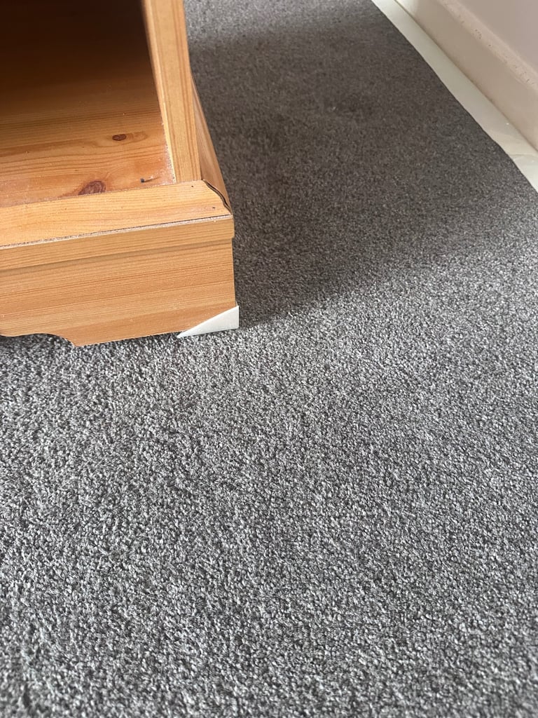 Bedside cabinet on casters 