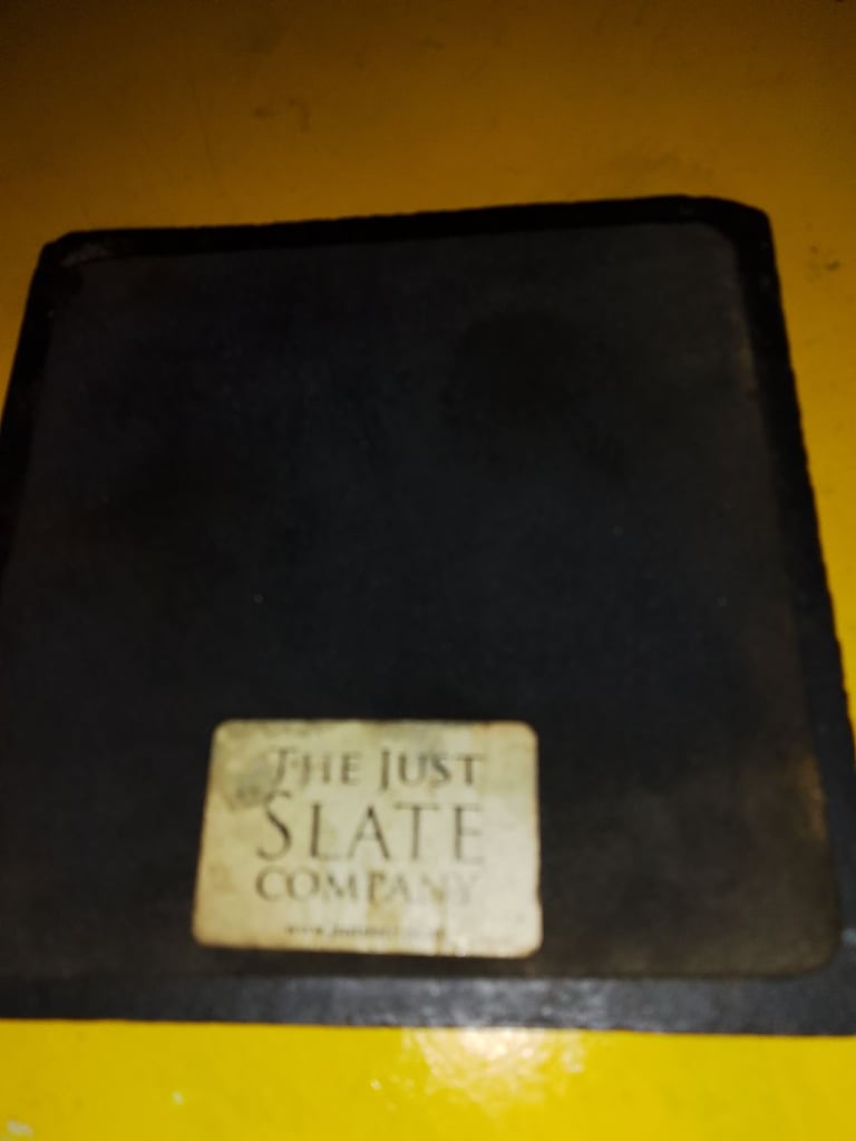 The Slate company coasters and candle stand
