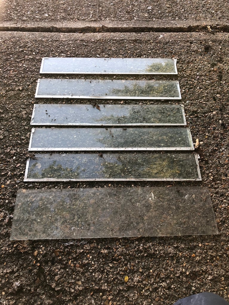 Panes of glass for greenhouse vents