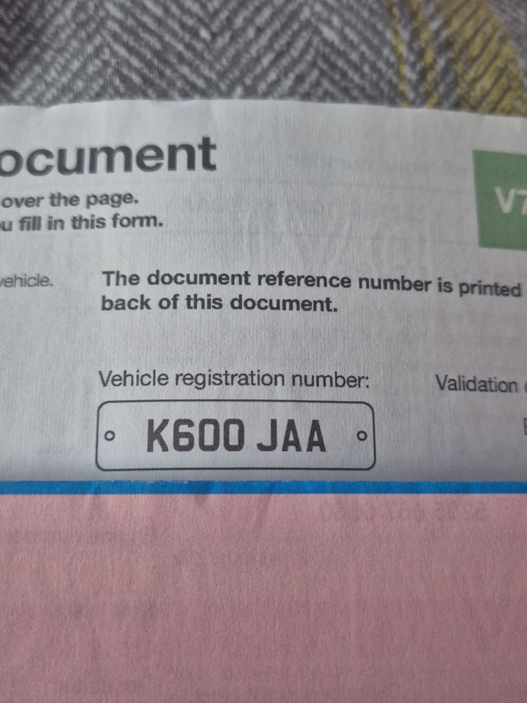 K600 JAA  private number plate on retention