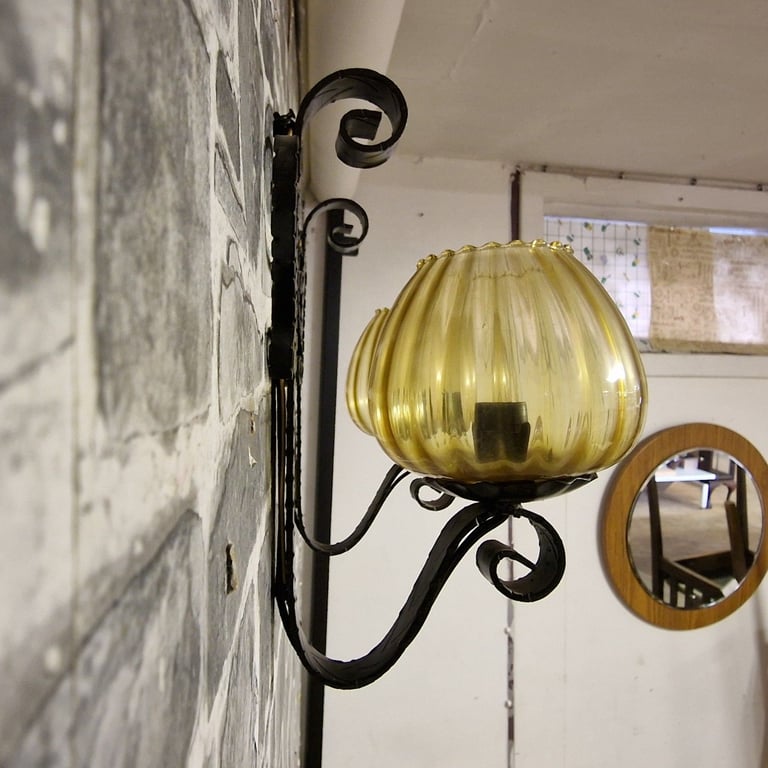 Pair of Vintage Wrought Iron Wall Sconces with Amber Glass Shades