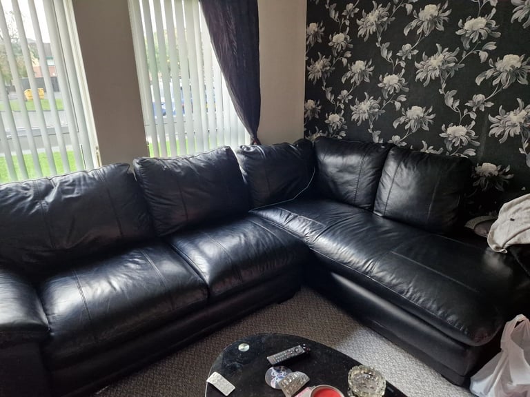 Black leather corner sofa ( SOLD PENDING UPLIFT )