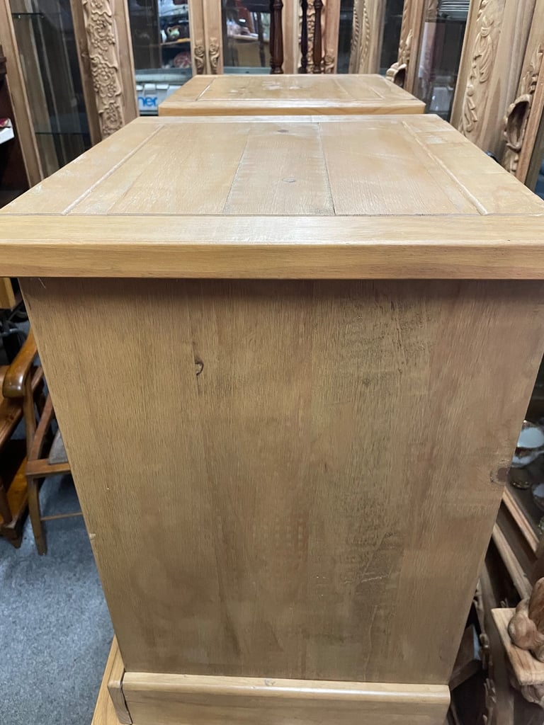 Two solid wood bedside cabinets