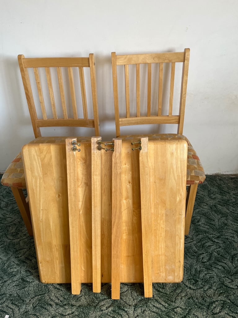 Small pine table and two chairs