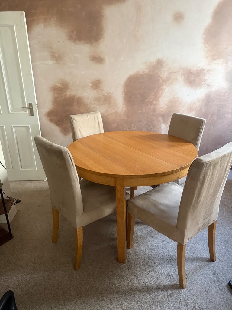 image for Round wooden table with four chairs 