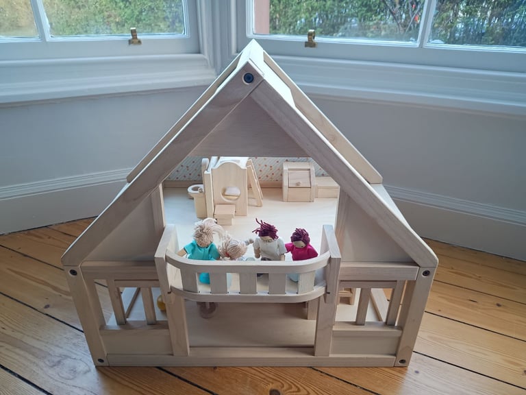 Plan toys wooden dolls house complete with furniture set and dolls, like new condition £120 ono