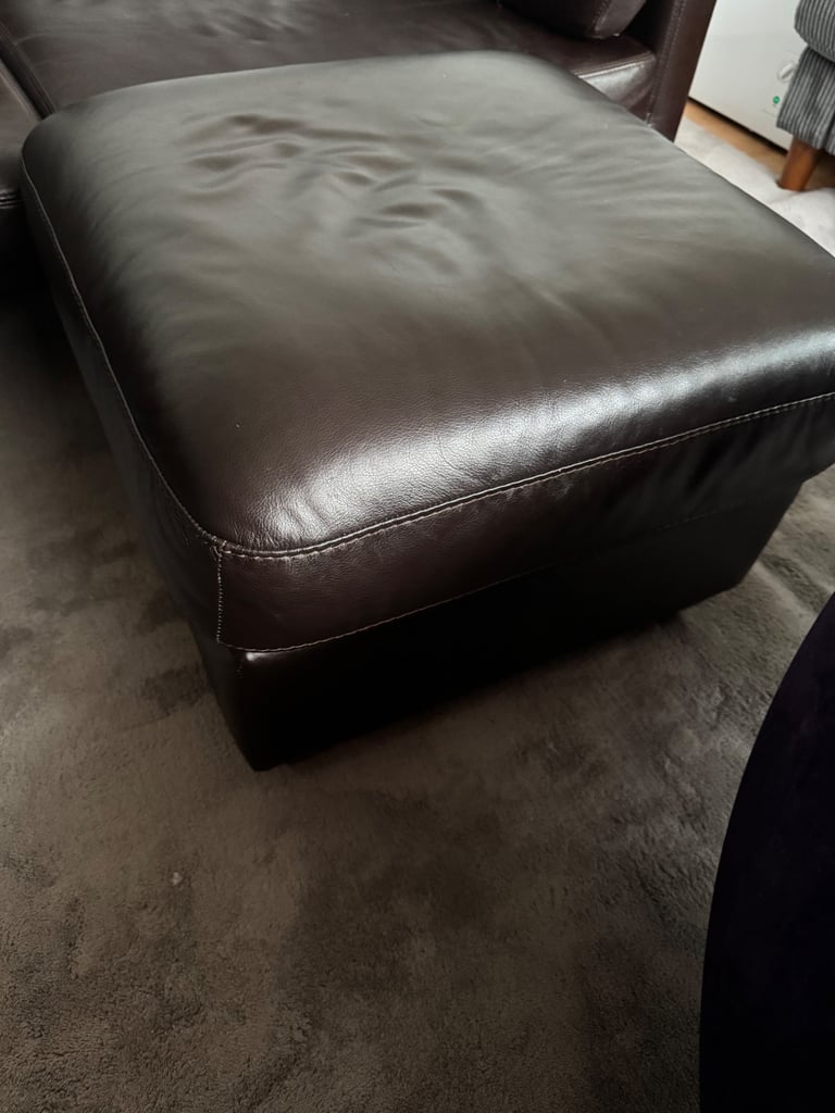 2 Seater leather sofa and puffer table 