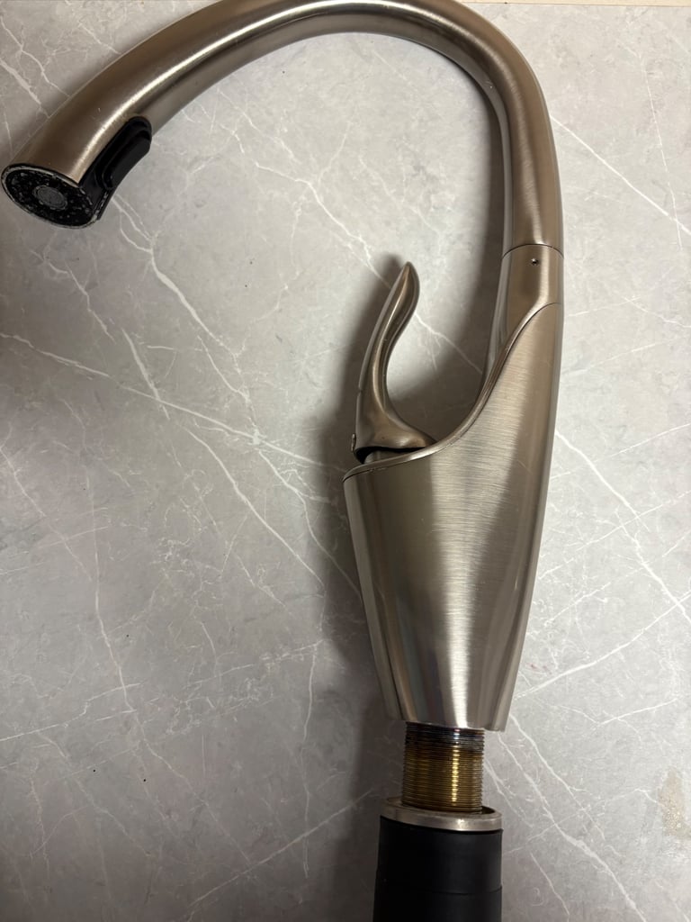 Kitchen tap with pull out spray 