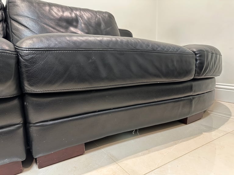 BLACK LEATHER SOFAS + FOOTSTOOL