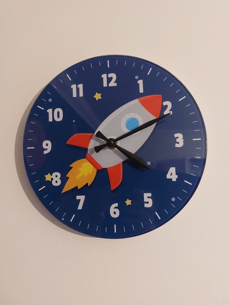 Space theme rocket wall clock