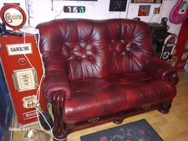 2 Seater leather and solid wooden settee