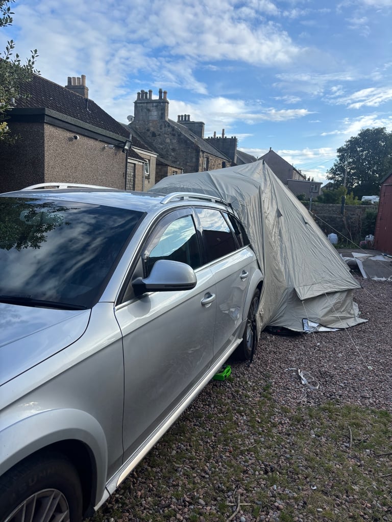 Car bell tent with log burner 