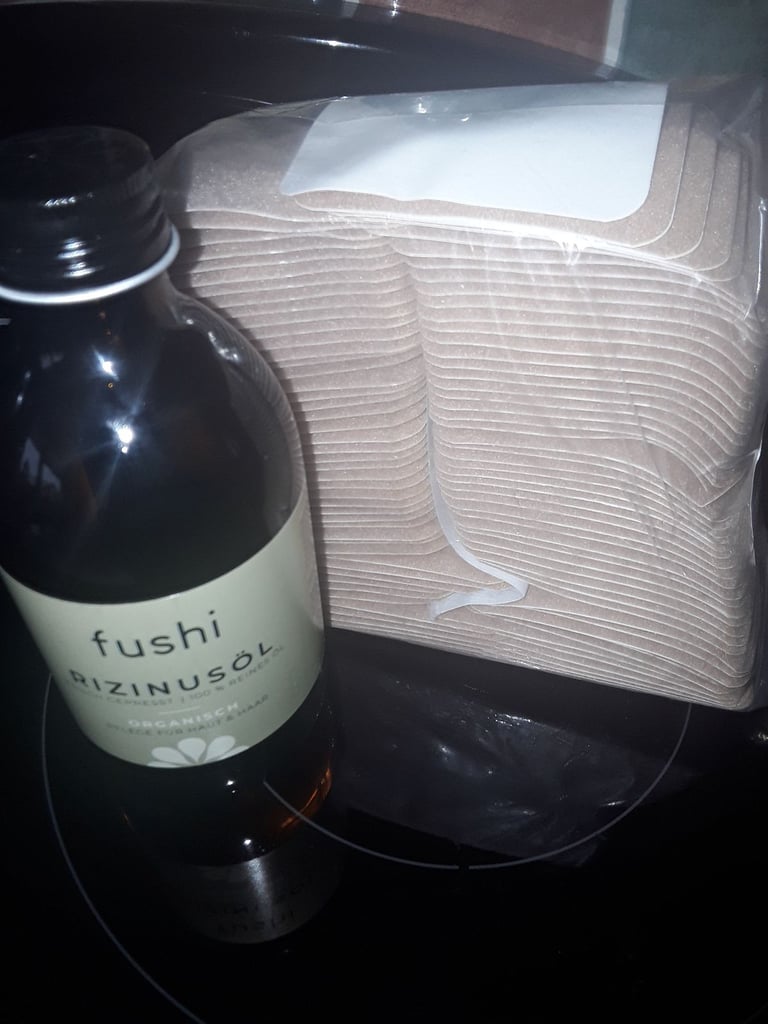 image for CASTOR OIL BELLY BUTTON PLASTERS AND A 'SEALED' BOTTLE OF CASTOR OIL
