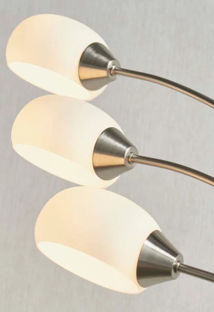 LED Modern floor lamp boasting a satin nickel finish