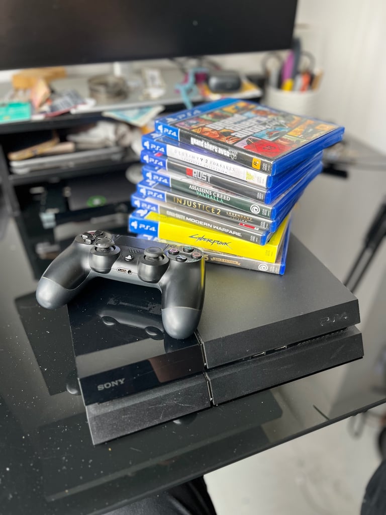 PS4 Console + 6 Games Bundle – GTA V, Valhalla, Cyberpunk & More