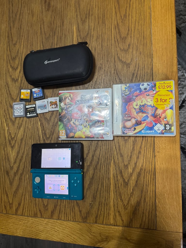 Nintendo 3ds aqua blue with 8 games