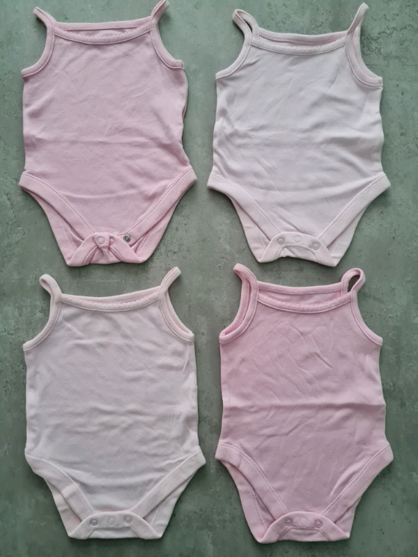 Pink sleeveless vests 