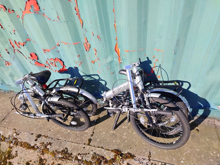 Apollo Transition folding bikes with bags