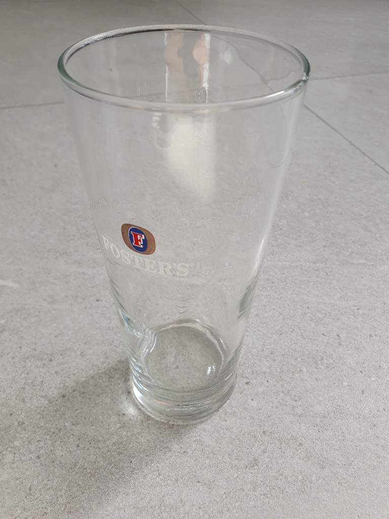 Embossed Fosters pint glass from 2000