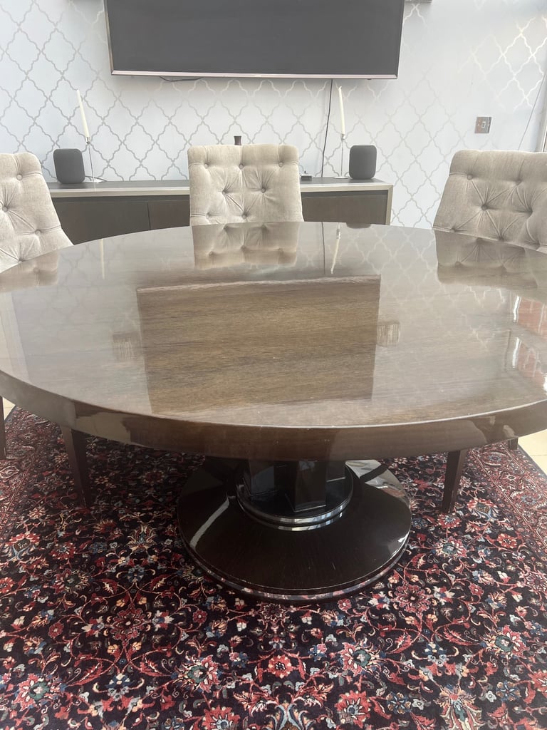 Luxury wooden dining table and velvet chairs 