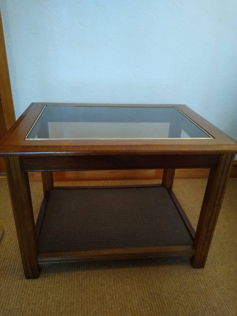 Glass topped coffee table