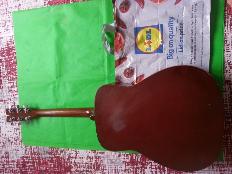 Large size guitar with good sound quality