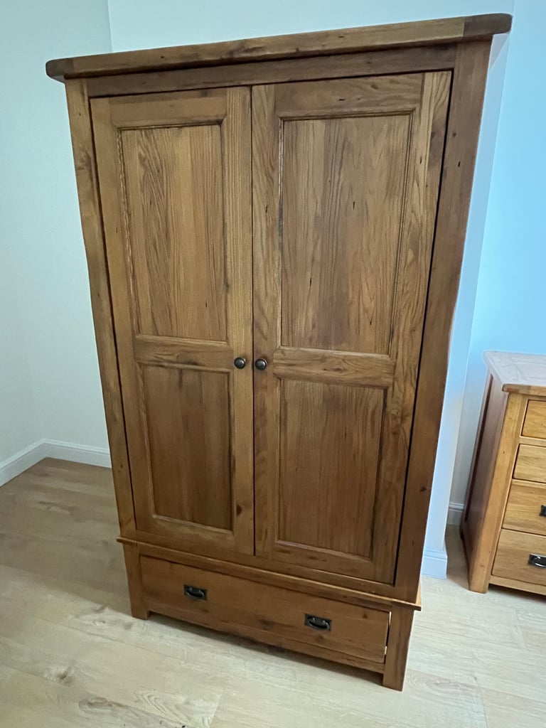 image for Rustic Sturdy Solid Oak Double Wardrobe Deep single drawer- £200 ono (H 192 cm W 112 cm D 57 cm)