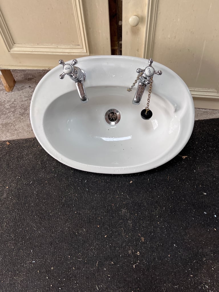Bathroom Basin with Vintage Cross Headed Taps and Vanity with Doors