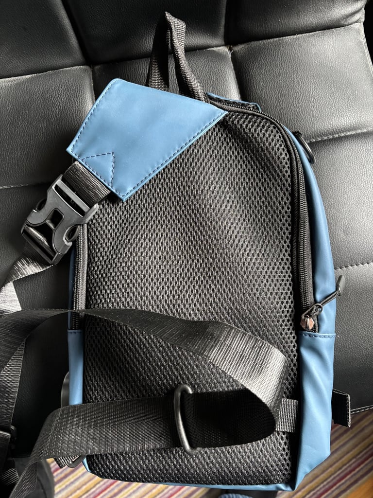 Cross body bag with anti theft pocket