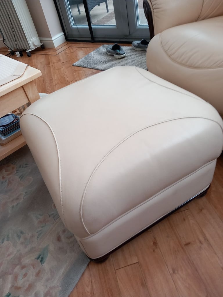 Leather armchair and footstool