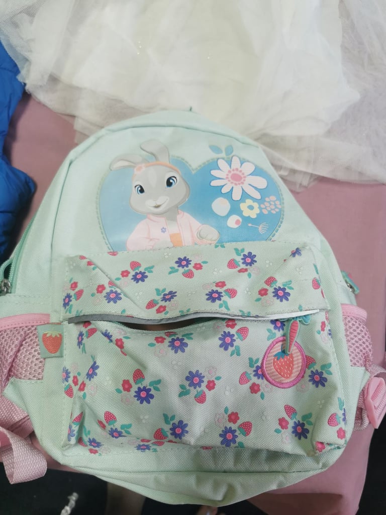 A set of clothes for a 5-6 year old girl. Most of the clothes are in good condition. 