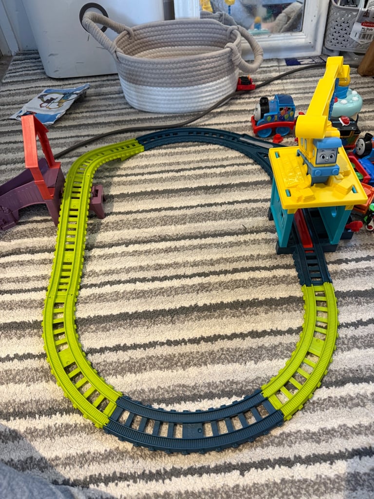 2 Thomas & friends train sets with trains. 