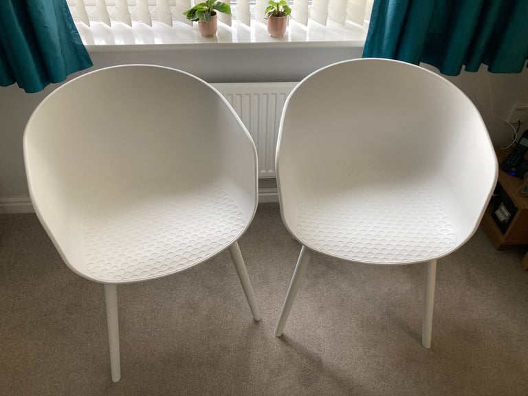 White moulded chairs 