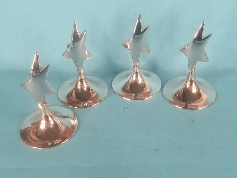 Stainless steel STAR PLACE CARD HOLDER. As seen.