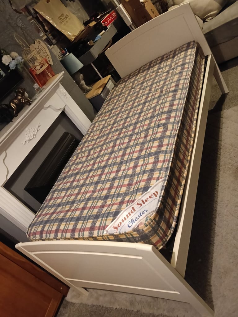 White wooden single bed and mattress 