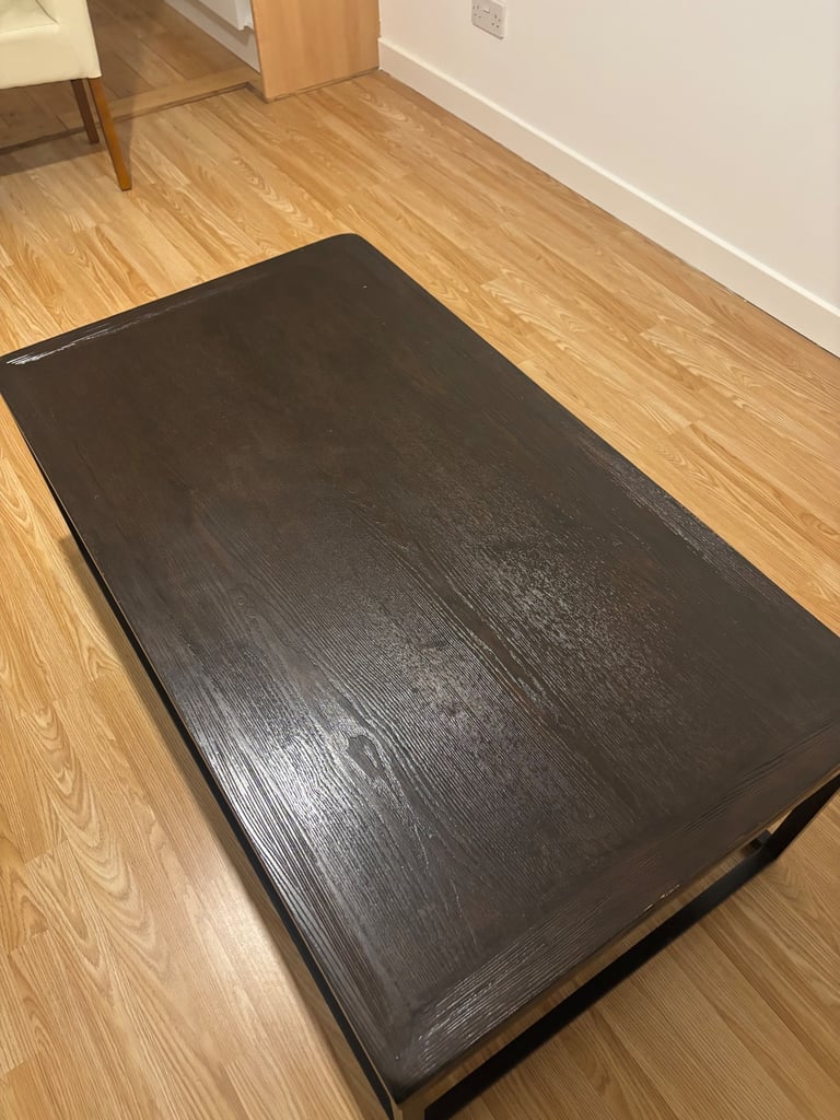 Dark brown wood coffee table