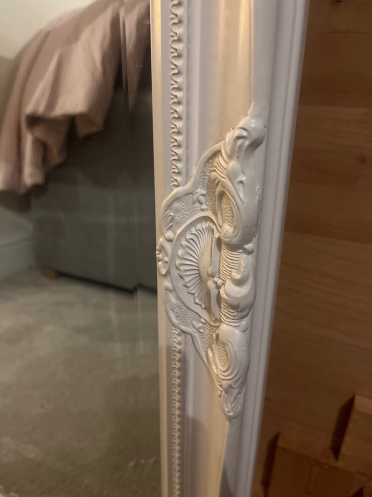 Large solid white mirror