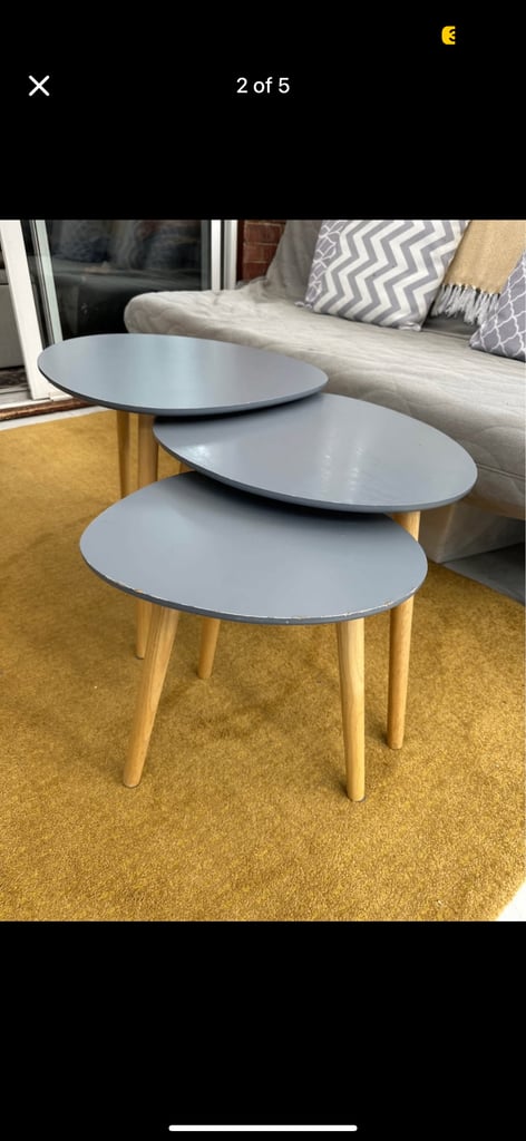 Grey ladder shelf with matching nest of tables