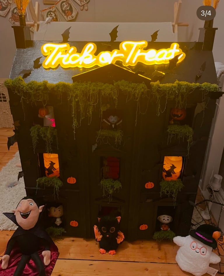 image for Large wooden haunted dolls house 