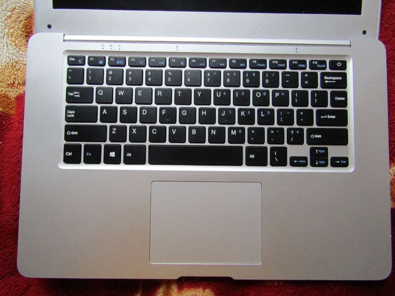 silver JOOMPER 14inch laptop tools in good condition lightly used 64GB own charger