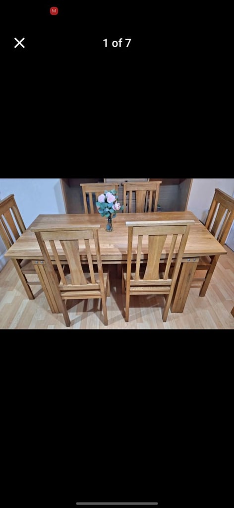 image for Solid oak dining table with 6 matching chairs 