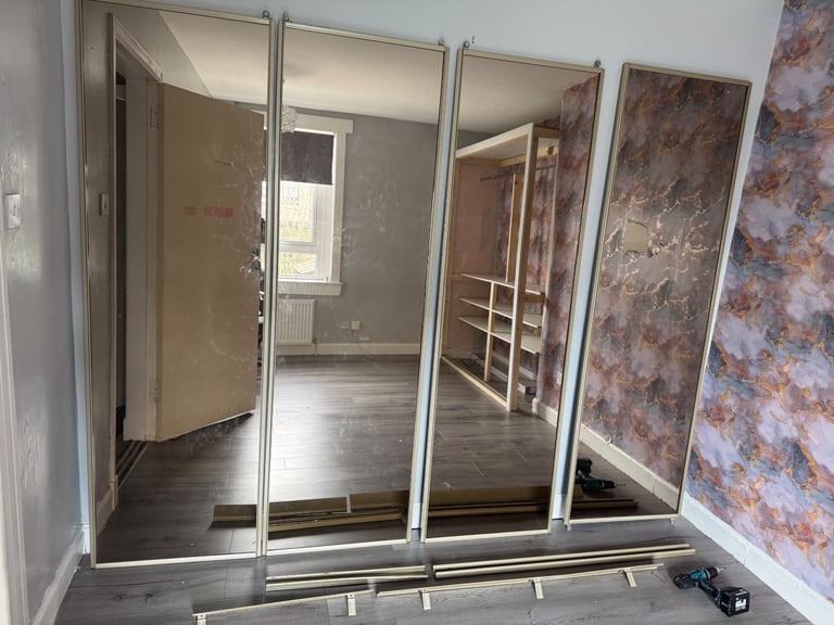 4x Rose gold tinted sliding mirror wardrobes 
