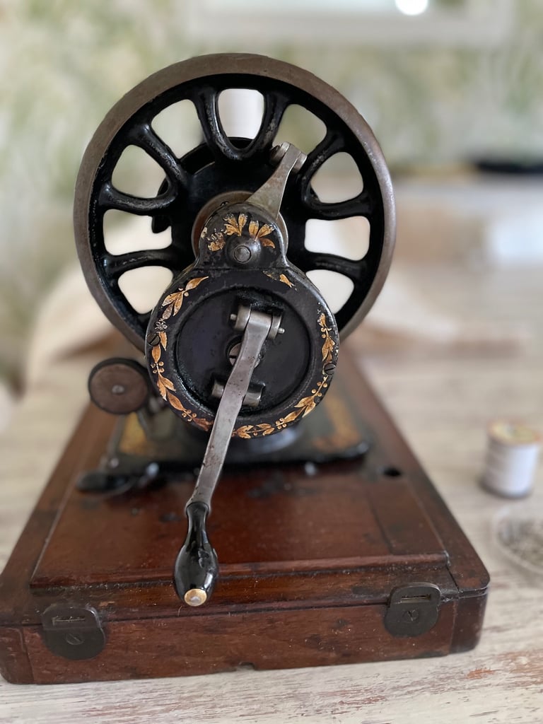Vintage hand cranked singer sewing machine 