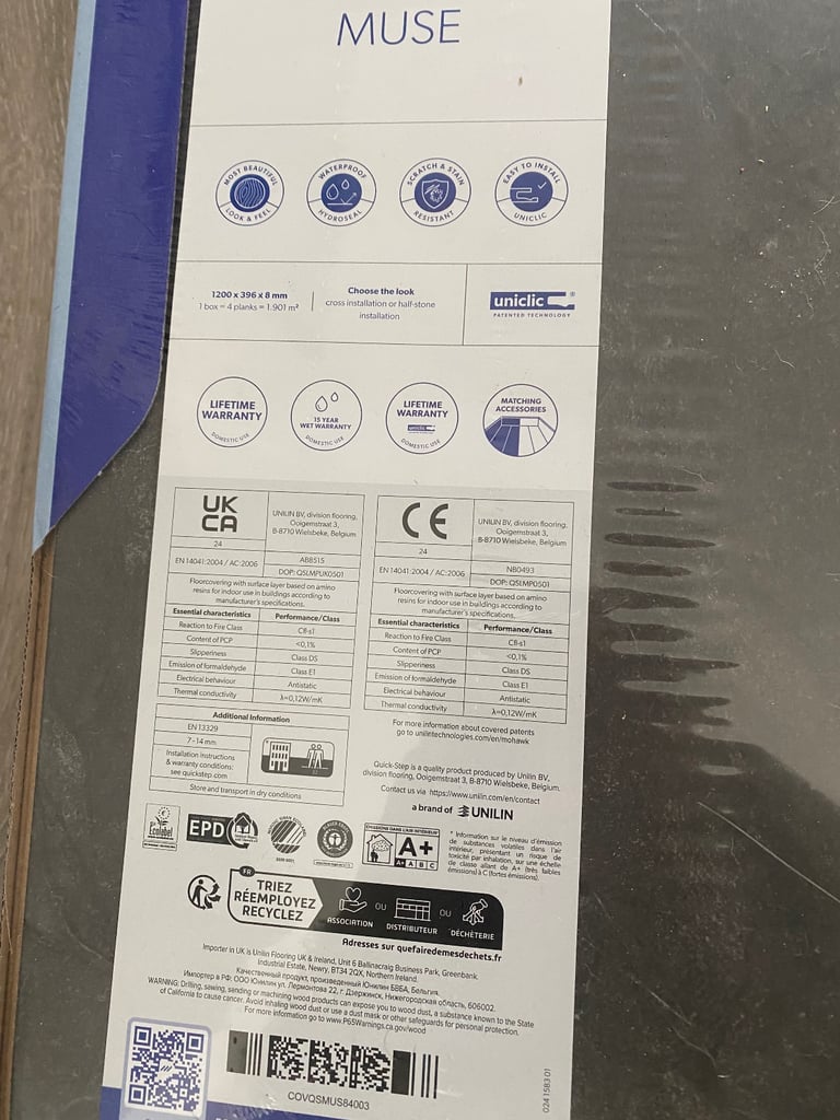 Laminate slate grey tile effect flooring 