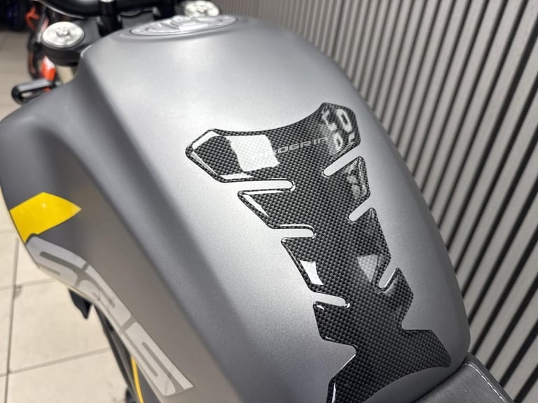 Voge ac525X in grey with yellow decals and only 211 Miles retro adventure