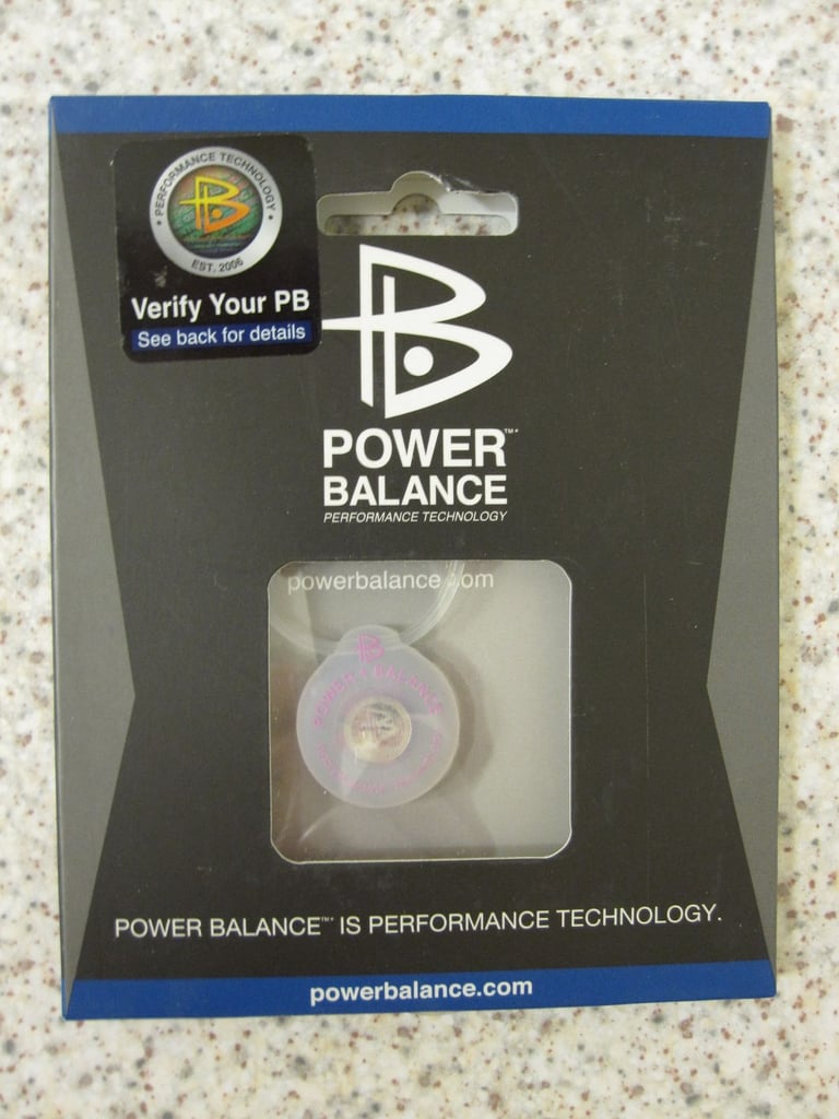 image for PowerBalance Clear Silicone Pendant (Clear with Fuchsia Writing)