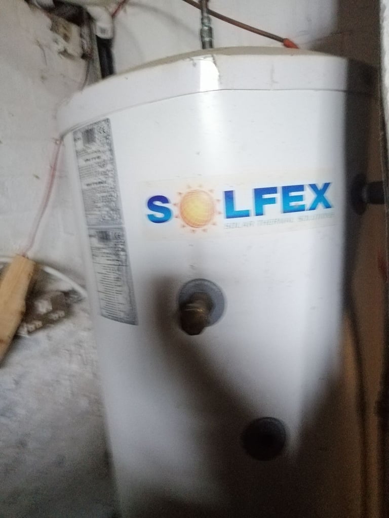 30kw Ottawa Multifuel wood stove + 300lts Solfex hot water cylinder+ roof solar thermal panel