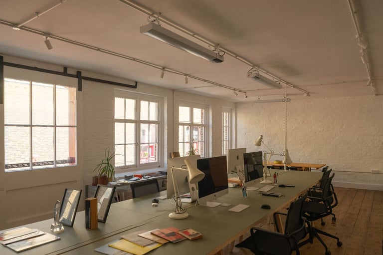 Desk spaces available in bright studio